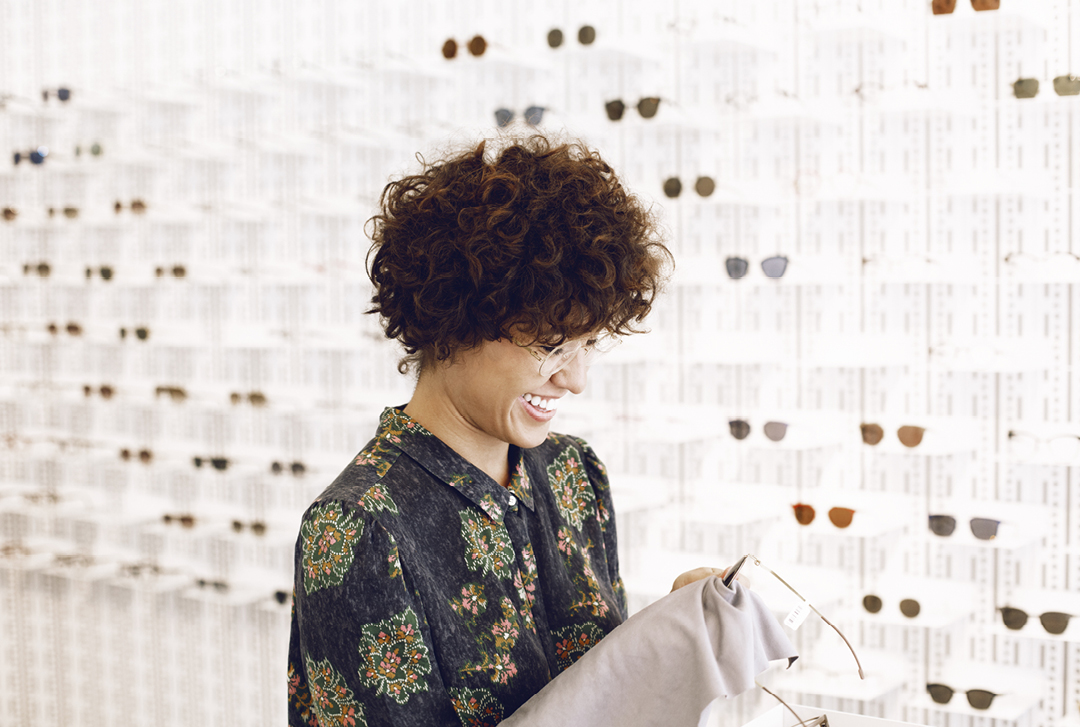 Lidia and Wulf, resident optometrists at the MYKITA Shop in Berlin-Mitte trying on different shapes of glasses and sunglasses